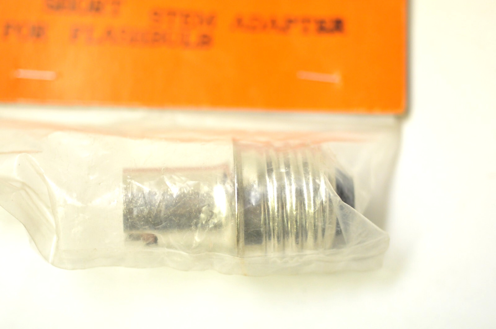 Telesar 1 7/8″ long short stem flashbulb adapter. New old stock.