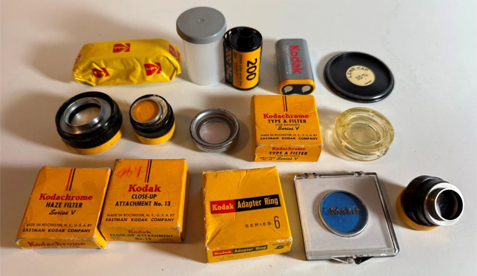 Vintage Assortment Kodak Lens Hoods Filters Adapter Rings & Film – 14 Pieces