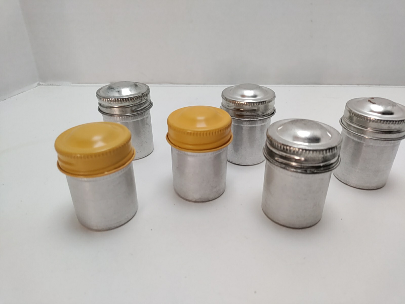 Set Of 4 Silver & 2 Yellow Lid 35 MM Film Canisters Empty Vintage