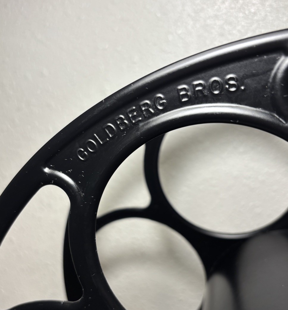 Goldberg Brothers Film Reel 15″ 35mm Theater Film Wine Rack Black