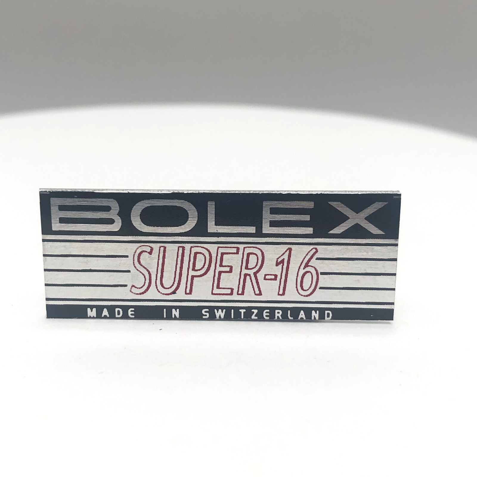BOLEX RED ‘SUPER-16′ LOGO PLATE BADGE’ (Glue-In) for BOLEX 16mm movie camera