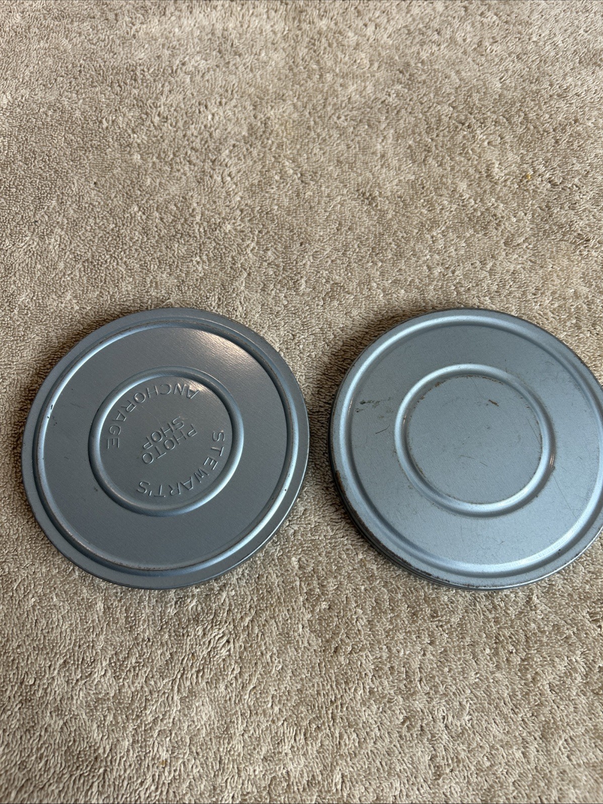 Two Vintage Stewart’s Anchorage Film Canisters In Grey With Mixed Reels 100-R07