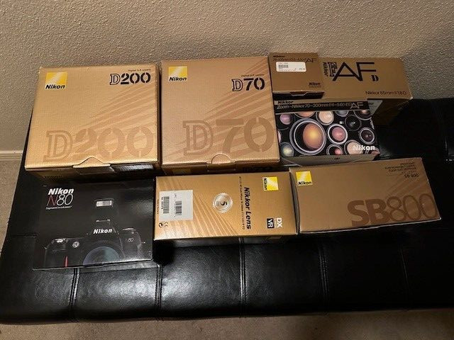 ASSORTMENT OF 8 NIKON CAMERAS, LENS & FLASH BOXES (ONLY)