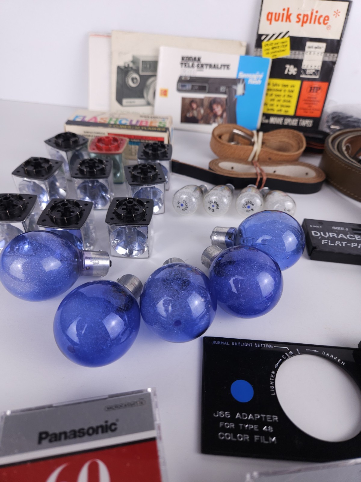 Junk Drawer Lot Of Vintage Camera Camcorder Parts – Bulbs Straps Tapes Manuals