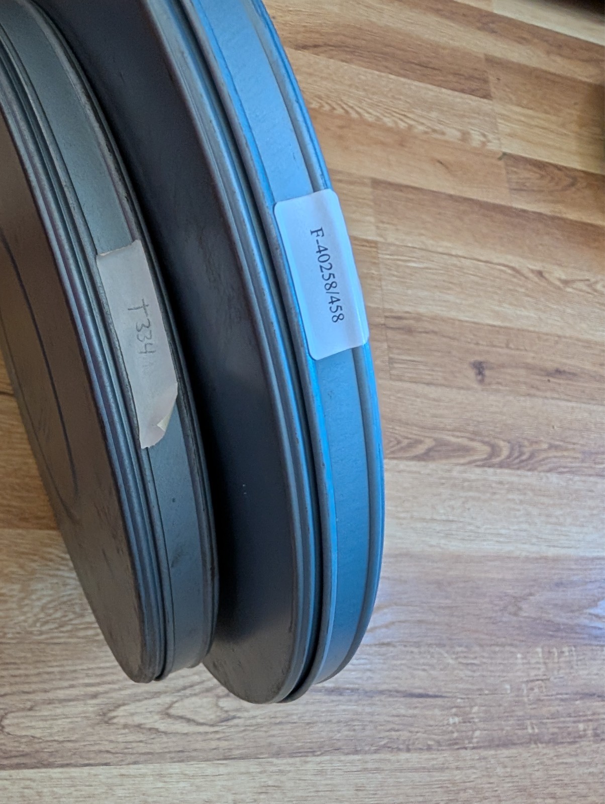 2 MPE 16mm Metal Film Reel 10 3/4 & 12 1/2 Canisters Bluish Tint