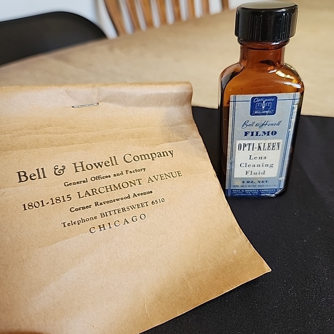 Vintage Bell & Howell Memorabilia Empty Bottle Of Opti-clean And Partial Tissue