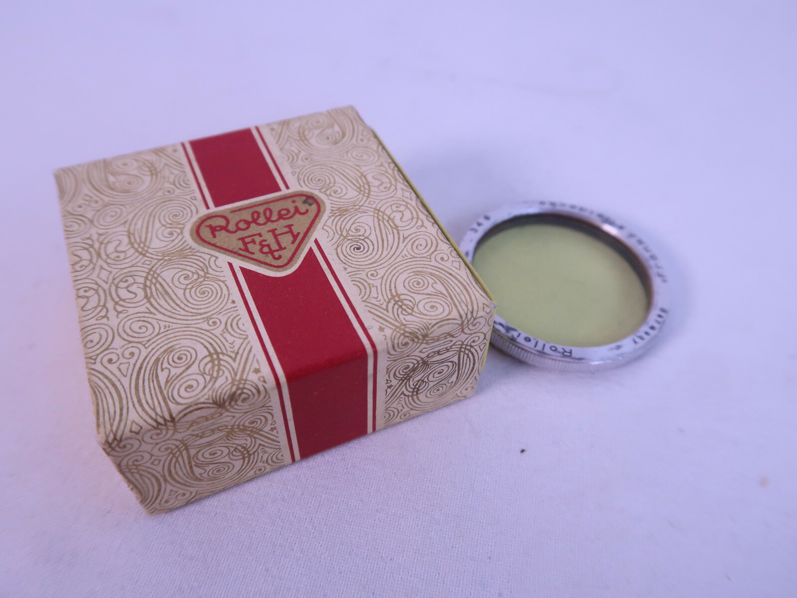 Vintage Genuine Rollei yellow filter Rolleiflex 4×4 Sport 2.8 lens. With keeper