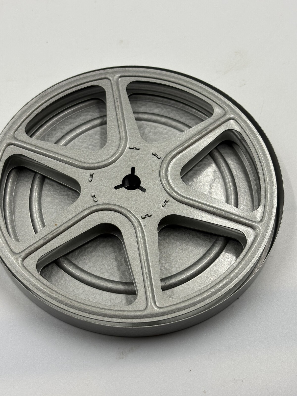 Vintage 5″ 8mm Metal Movie Film Reel & Can Clark’s Dept Store Sticker
