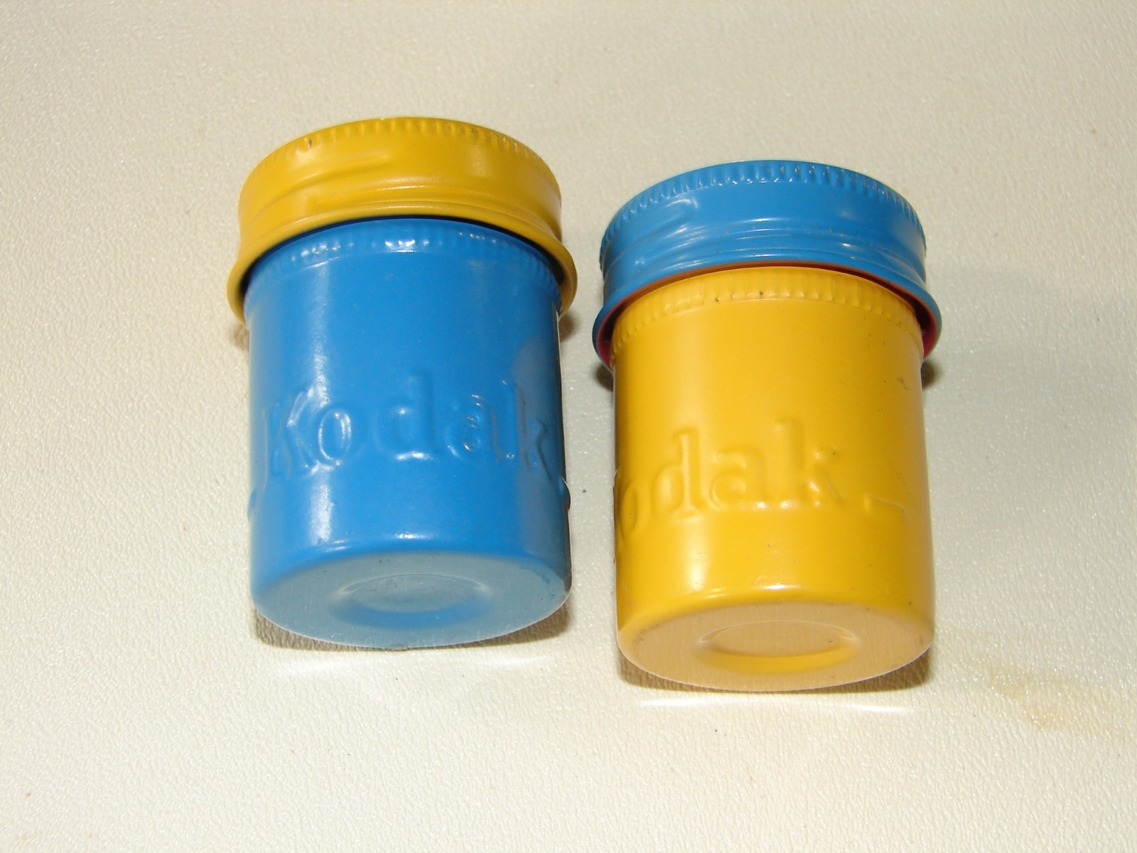 Kodak Metal Film Cannisters 1blue& yellow top & 1 yellow& blue top. Used VF cond