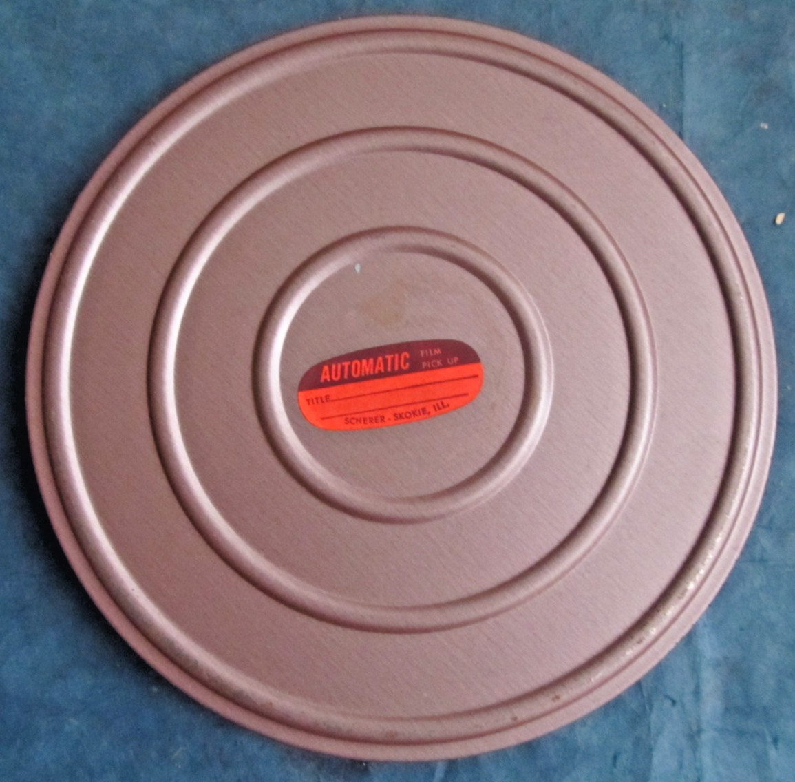 Vintage Mauve 8mm film canister/ box with reel
