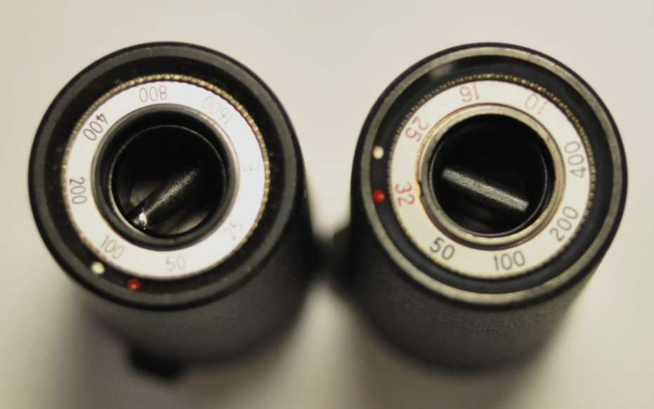 2-Nikon 35mm reloadable film cassette as shown. Two different. See images.