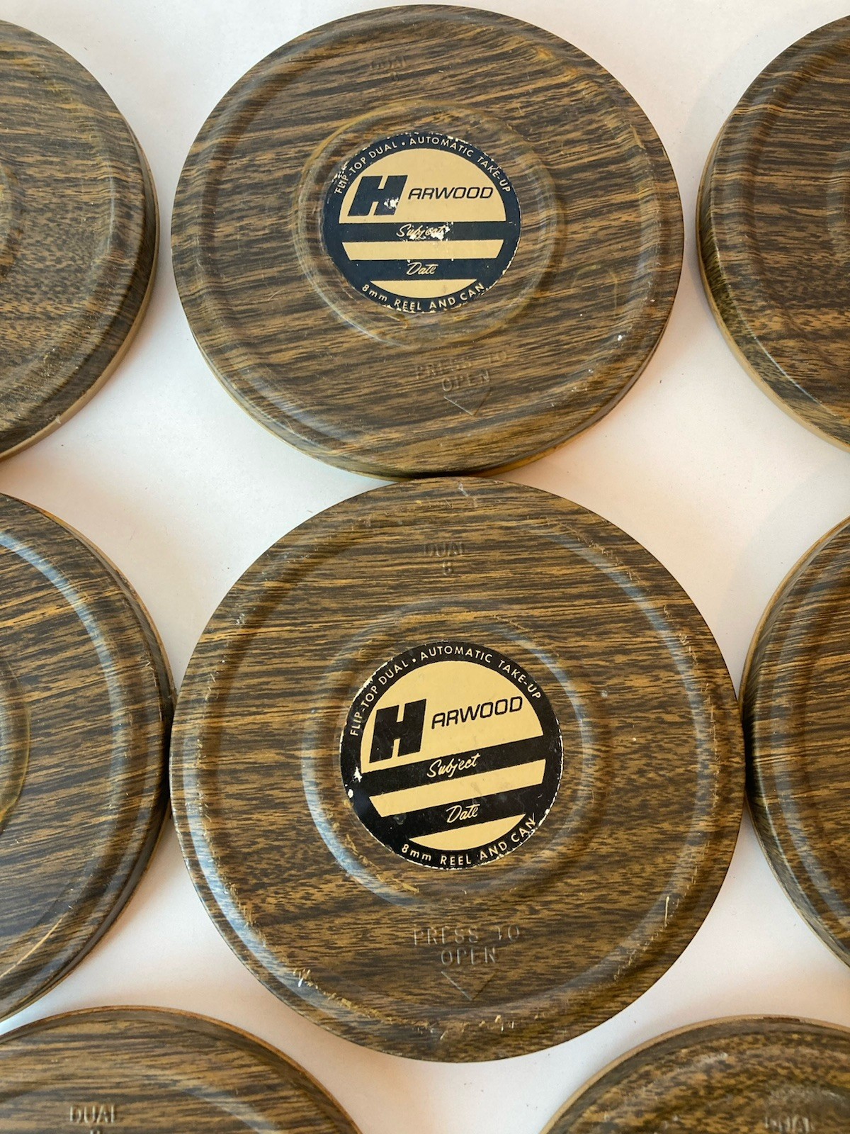 Set of 8 8mm Film Reel and Can Harwood See description