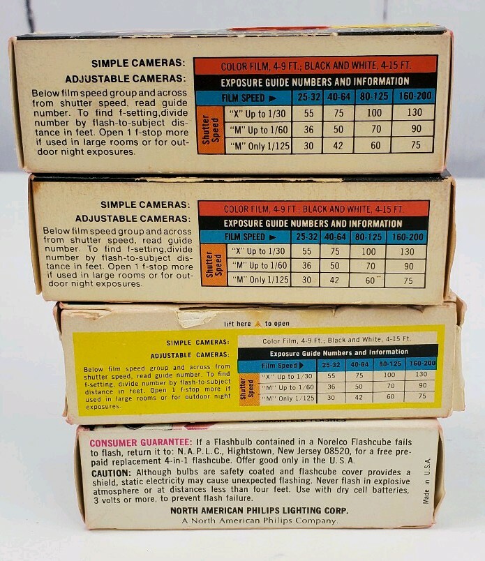 4 Camera Flash Cubes, 3 Boxes of Sylvania Blue Dot, 1 Box of Norelco NOS Bulbs