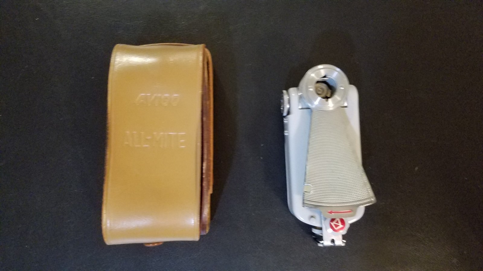 VINTAGE AVIGO ALL-MITE FOLDING FLASH ATTACHMENT WITH ORIGINAL LEATHER CASE