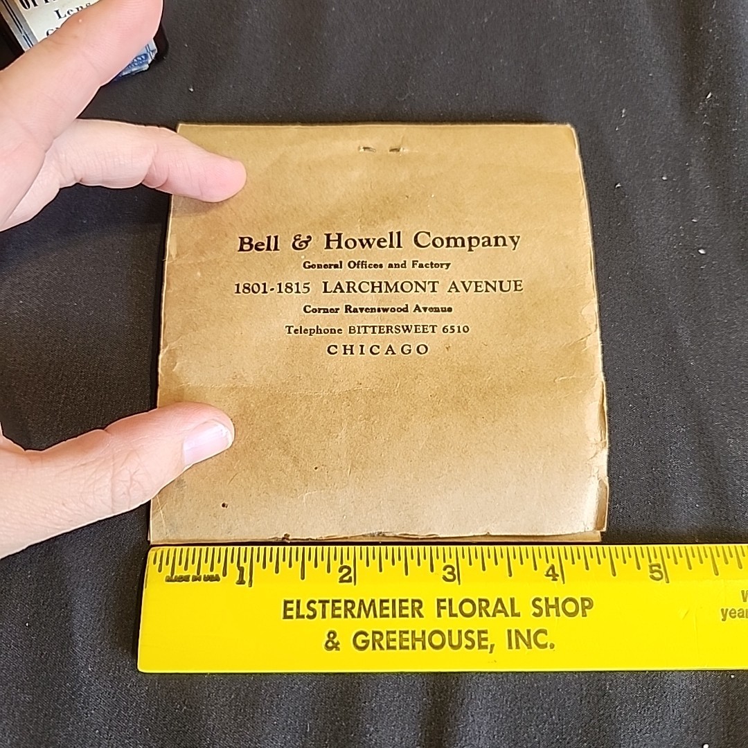 Vintage Bell & Howell Memorabilia Empty Bottle Of Opti-clean And Partial Tissue