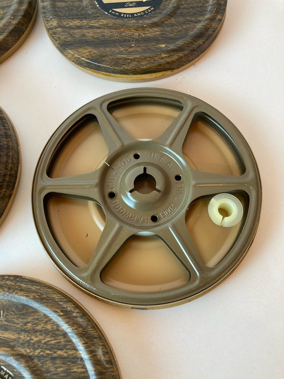 Set of 8 8mm Film Reel and Can Harwood See description