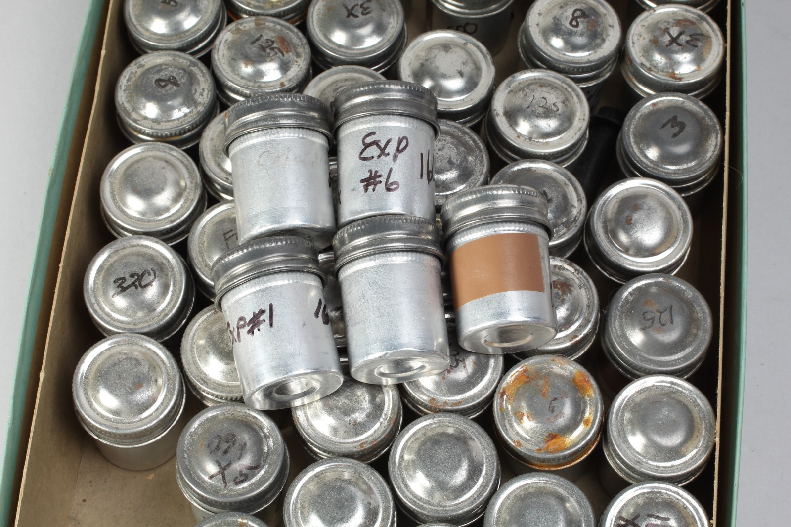LOT OF 57 RELOADABLE 35MM CASSETTES W ALUMINUM FILM CANISTERS FUJI & AFTERMARKET
