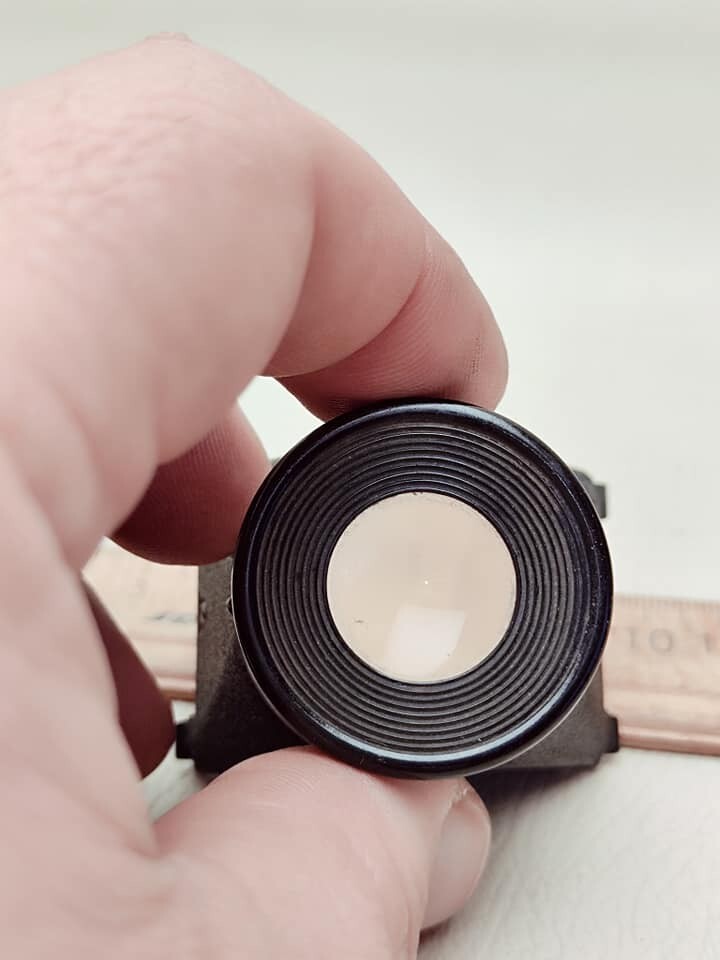 Magnifying glass for viewing 35 mm film photo, made in USSR