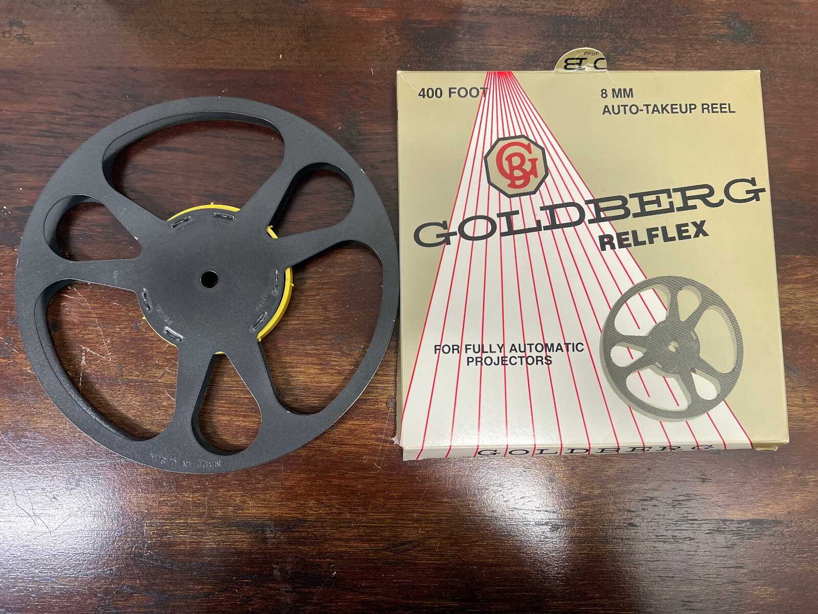 Lot of 12 Vintage Goldberg 8mm Relflex 400′ 7″ Film Reel & Box. New Old Stock