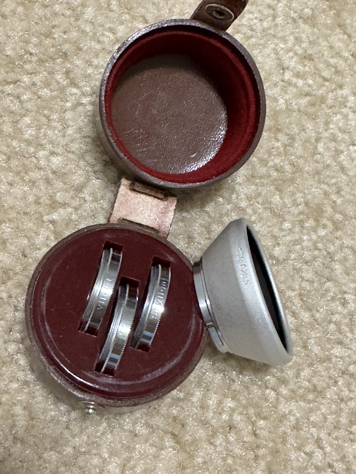 Zeiss Ikon 1110 28.5mm Push-On Lens Hood And Three 27mm Filters