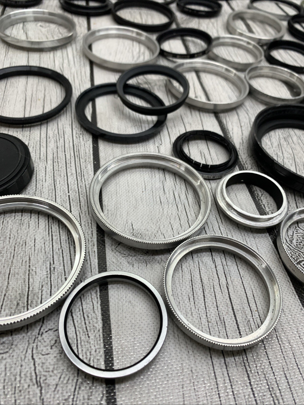 Vintage lot Camera Parts Hoods Caps Lens Adapters 36 pieces