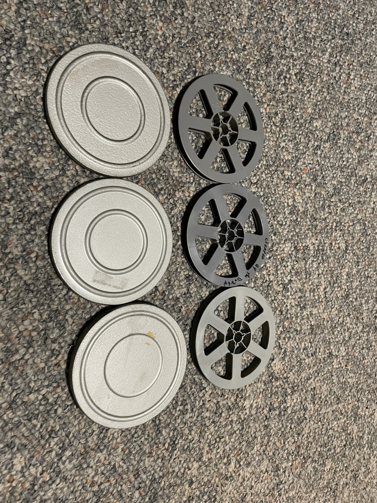 Three 200 feet Super 8 movie reels with cans