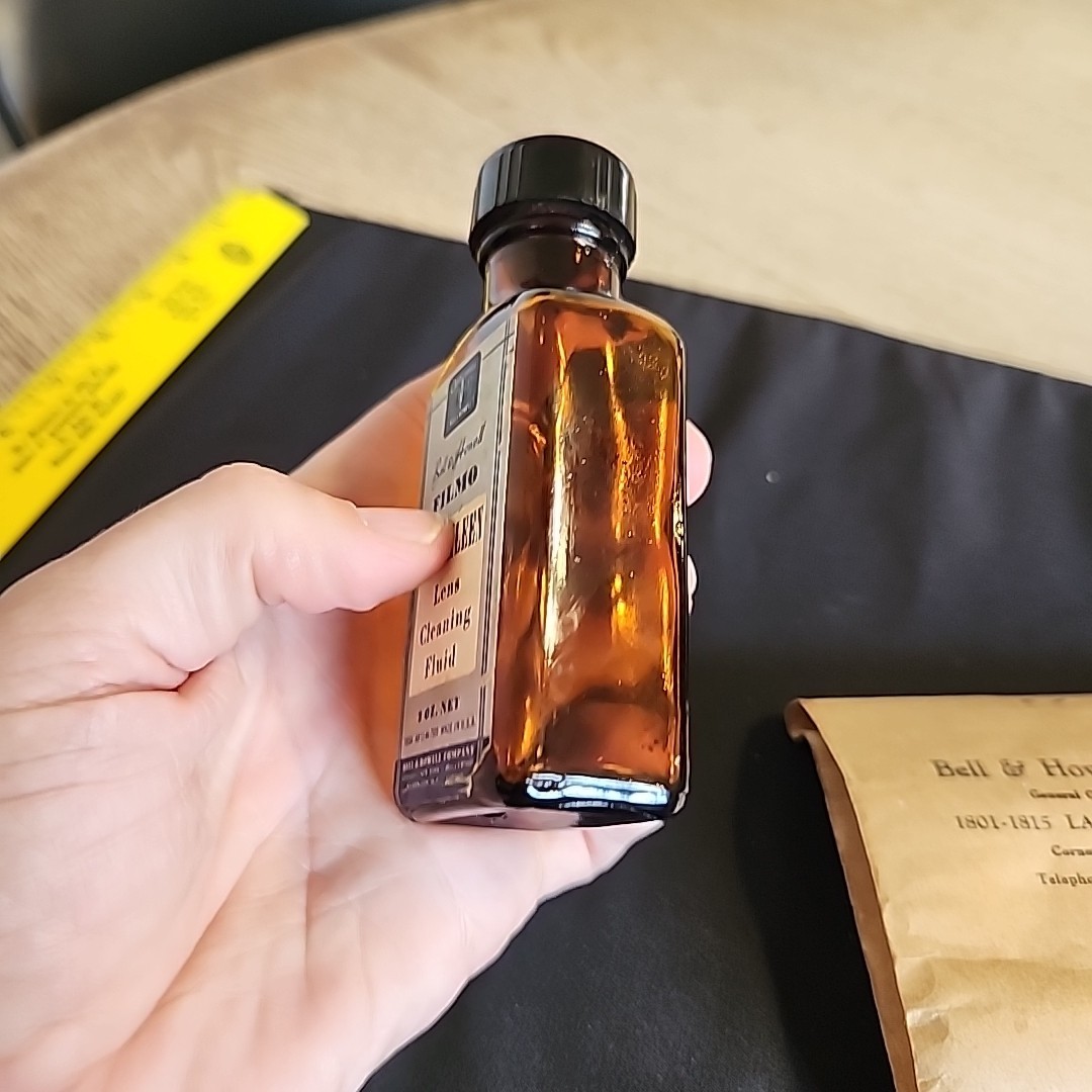 Vintage Bell & Howell Memorabilia Empty Bottle Of Opti-clean And Partial Tissue
