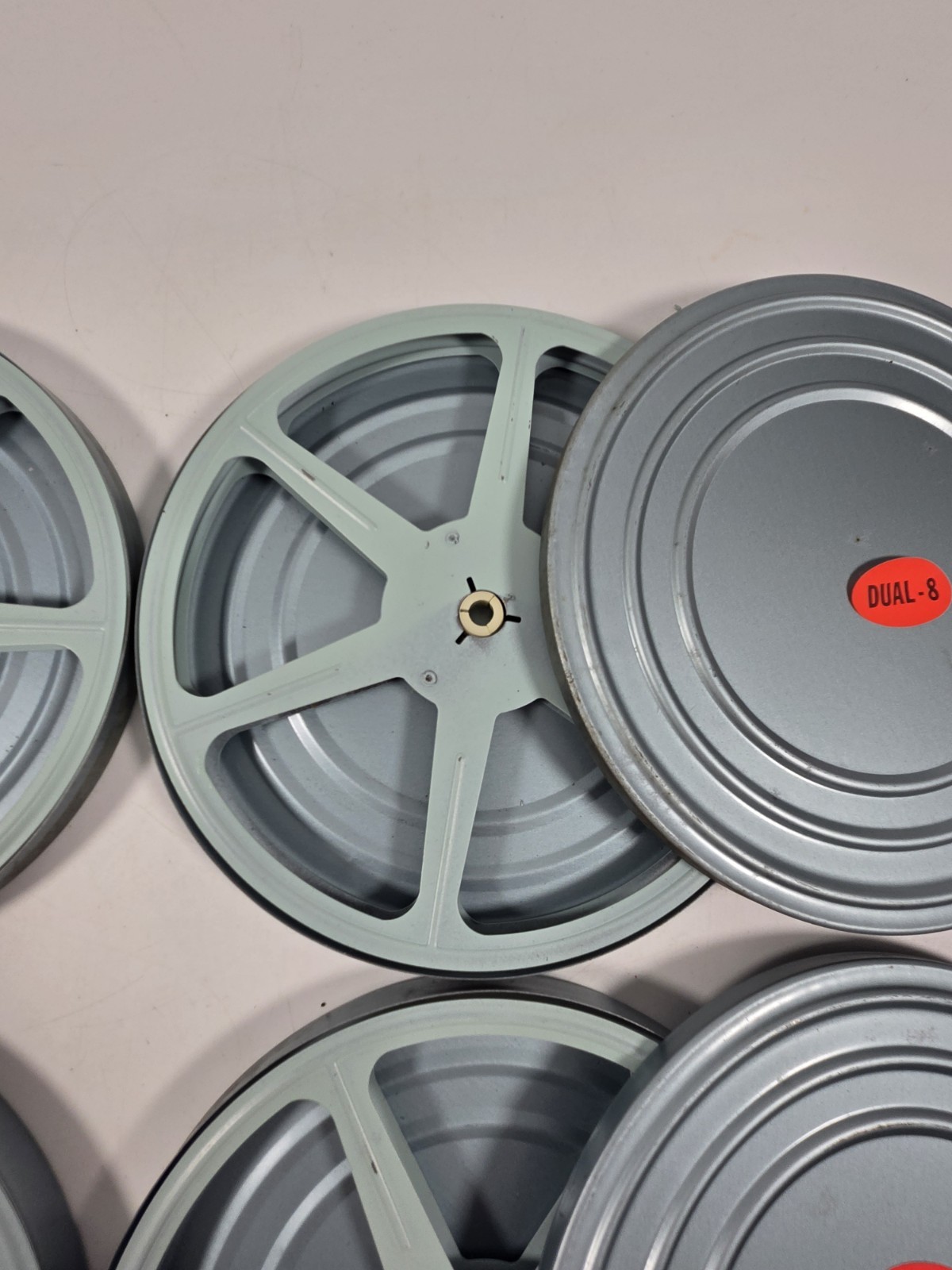 Set Of 4 Vintage Dual-8 8mm 7 in metal reel and can Old School Tv Nostalgia