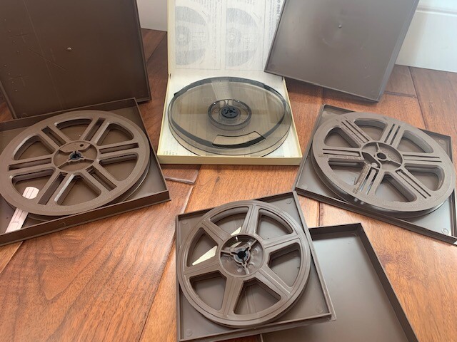Lot of Vintage 7 Inch 8mm Metal and Plastic Film Reels, Cans, and Movies