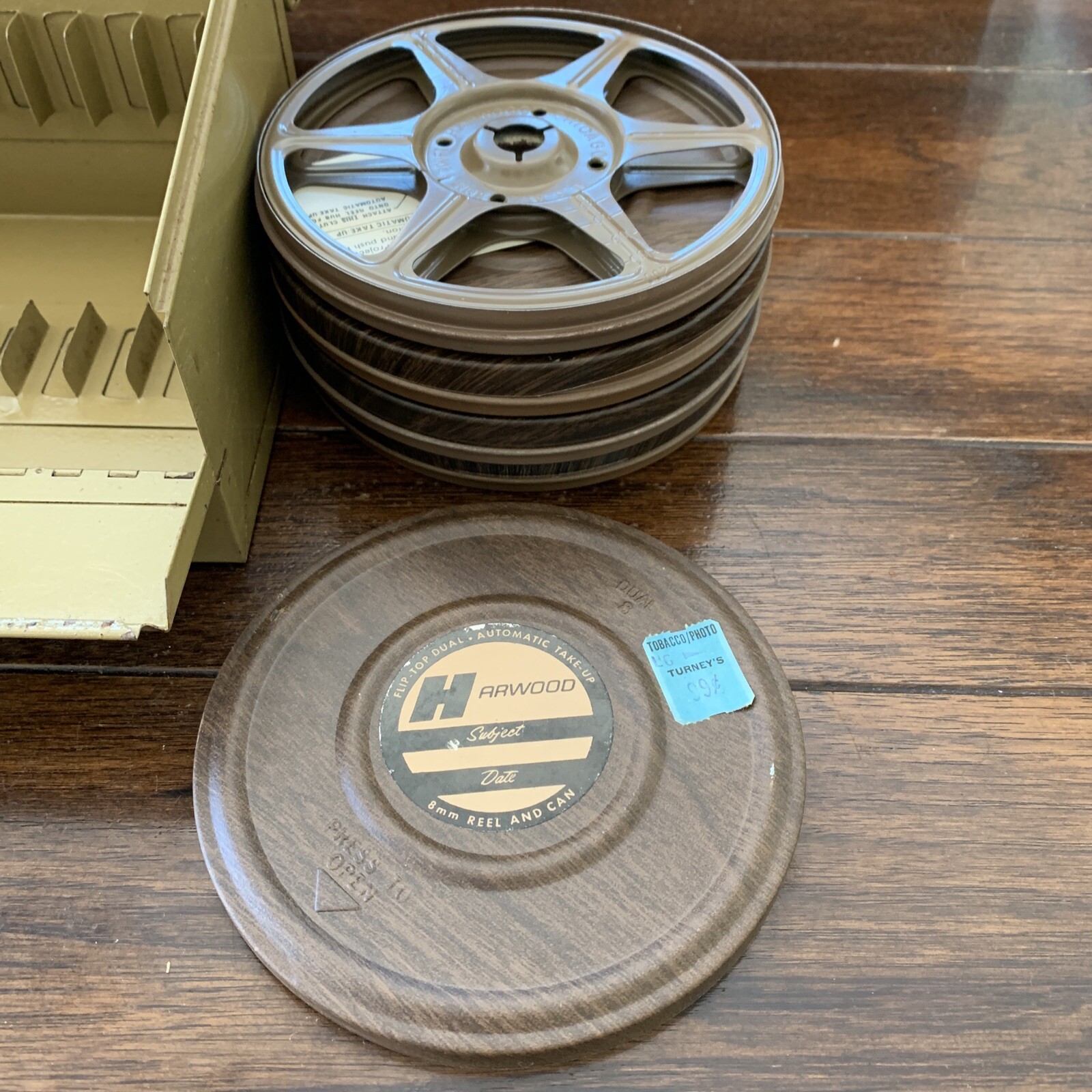 Vintage 8mm Film Set With 12 Slot Metal Case And Reels In Very Good Condition.