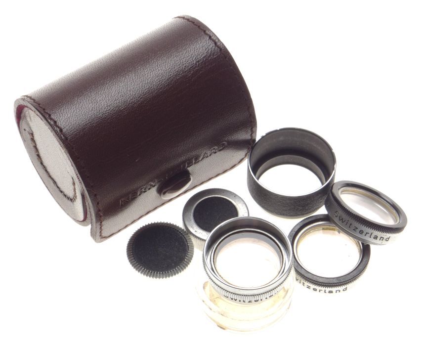 Kern paillard bolex cine camera body lens caps filters shade hood leather keeper