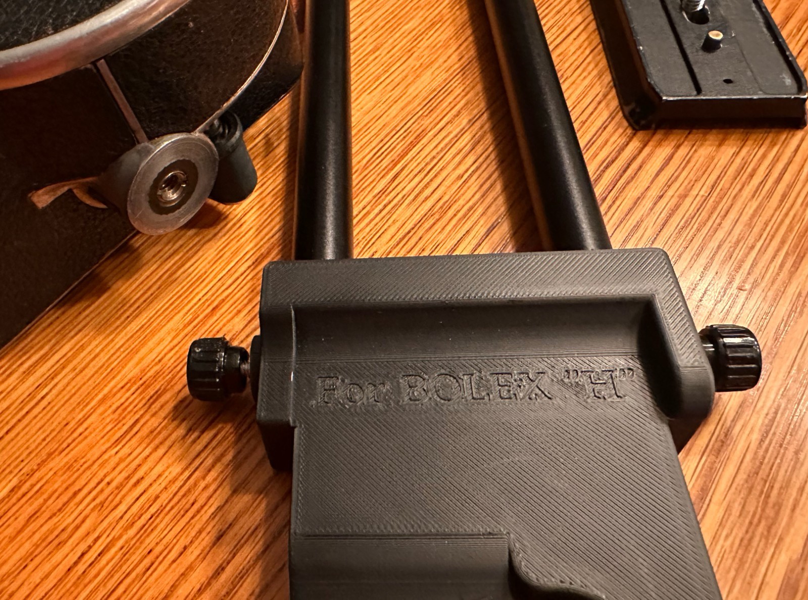 Bolex Saddle for 15mm Rods 60mm on Center – for “REX1 2 or 3” Round Base Cameras