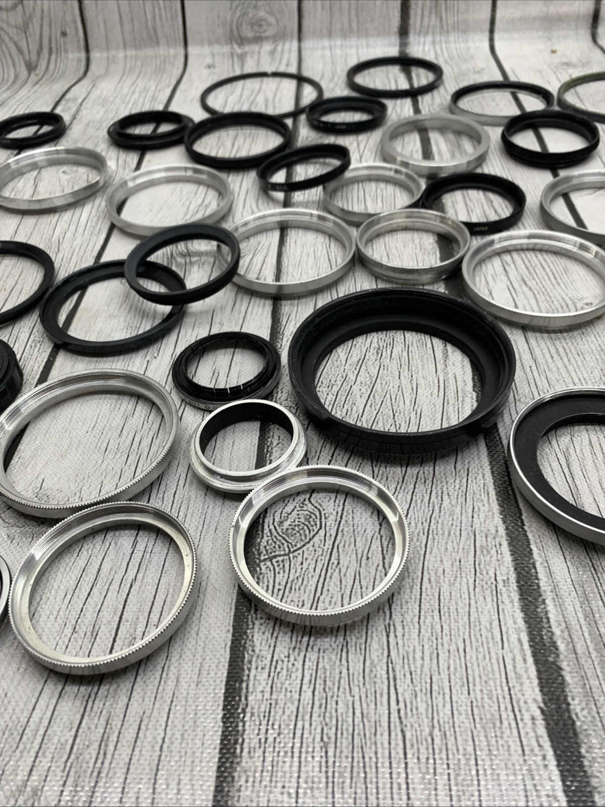 Vintage lot Camera Parts Hoods Caps Lens Adapters 36 pieces