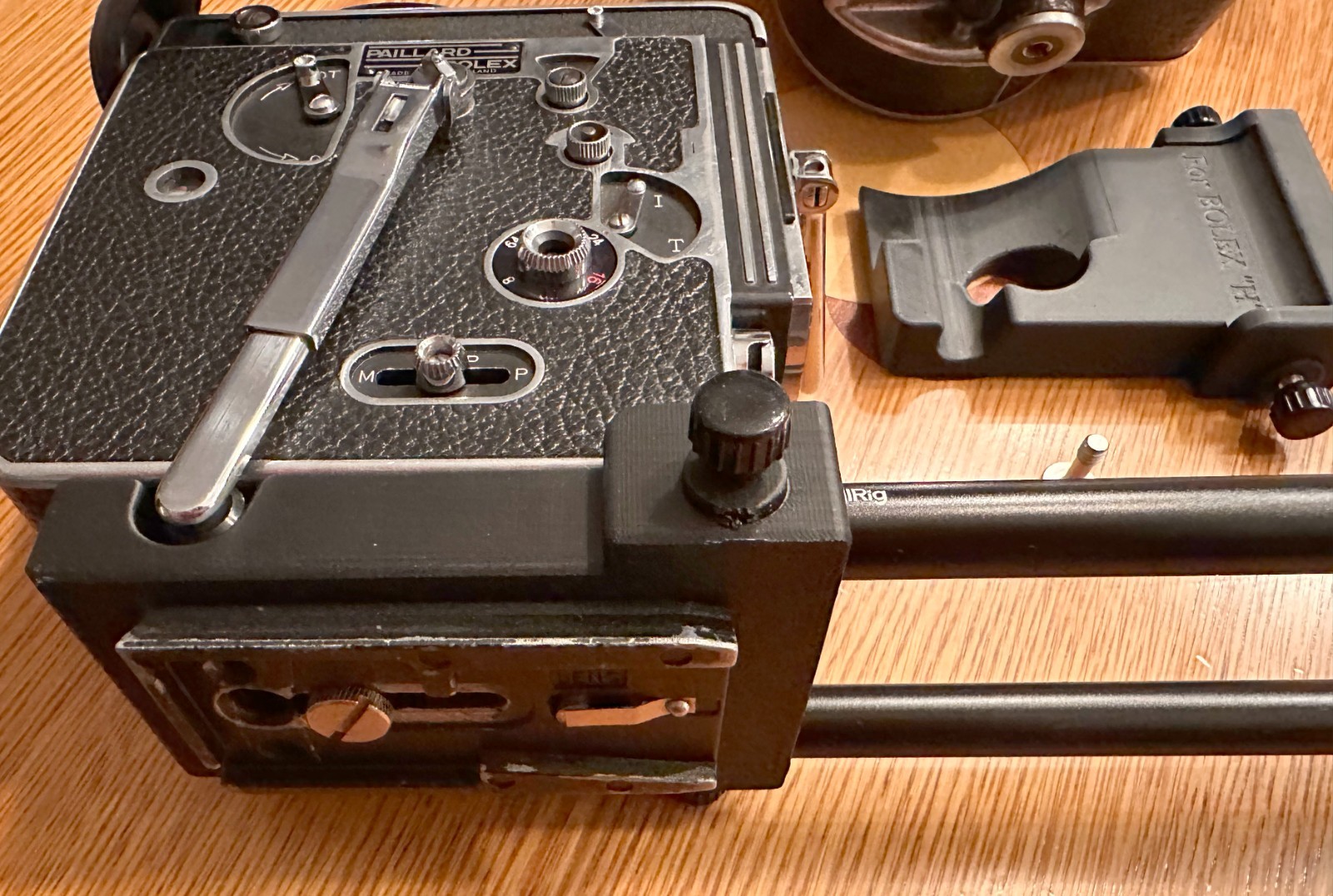 Bolex Saddle for 15mm Rods 60mm on Center – for “REX1 2 or 3” Round Base Cameras