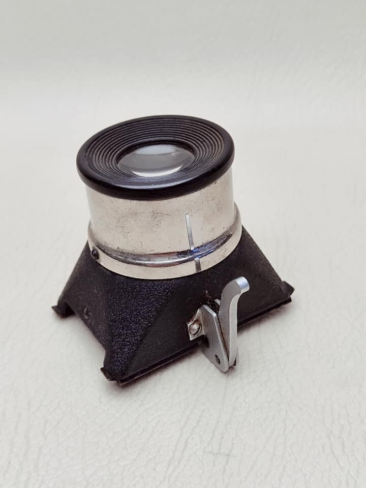 Magnifying glass for viewing 35 mm film photo, made in USSR