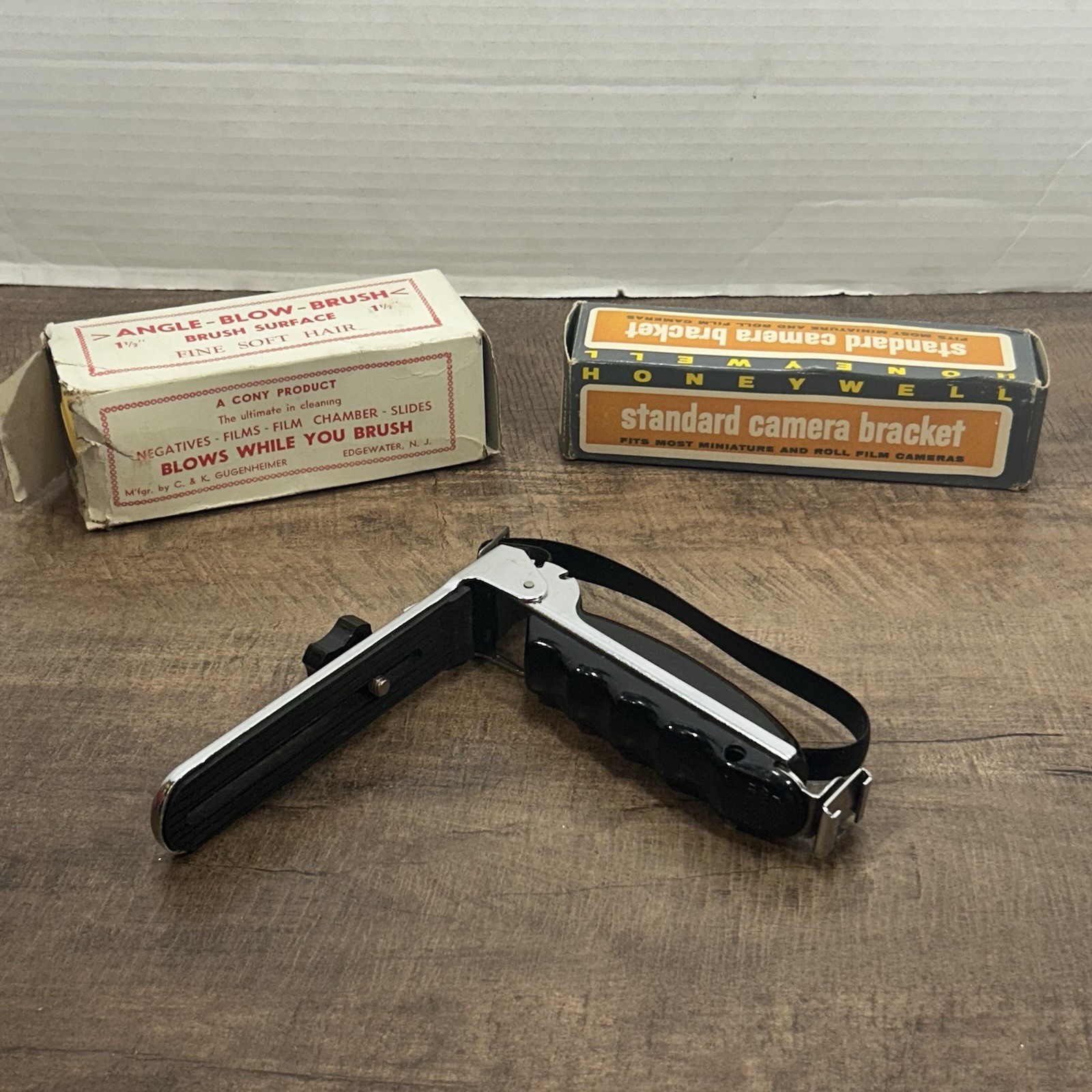 Lot of 3 Vintage camera accessories, 2 camera brackets & 1 angle blow brush