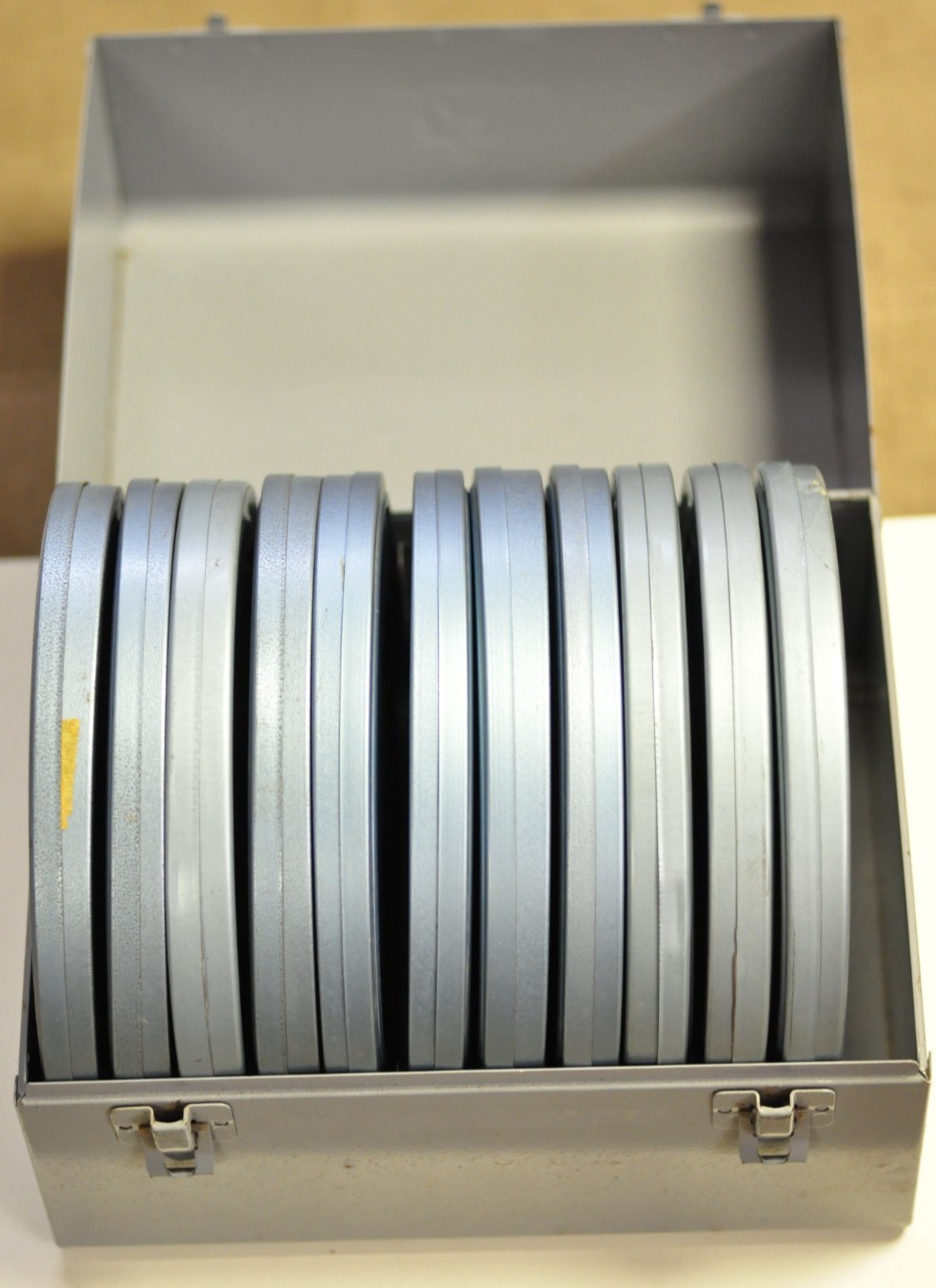 Brumberger metal movie case with 11-7 inch reels/cans. READ.