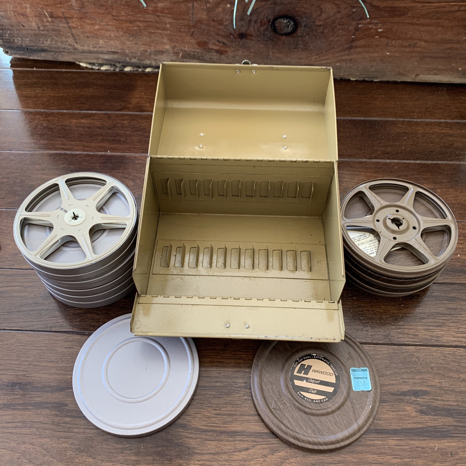 Vintage 8mm Film Set With 12 Slot Metal Case And Reels In Very Good Condition.