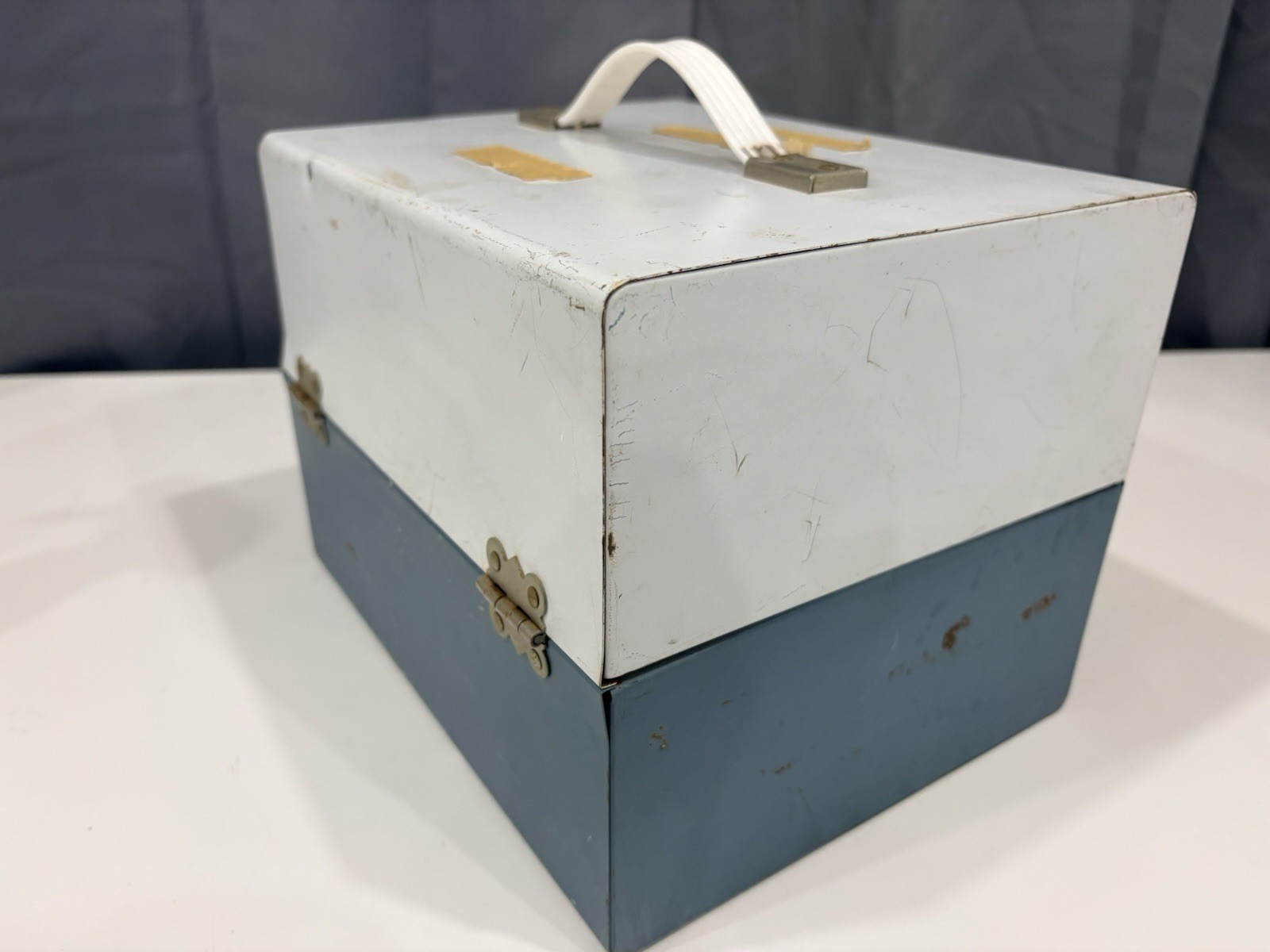 13 vintage 8mm film reels with 12 canisters and carrying case. No Film.
