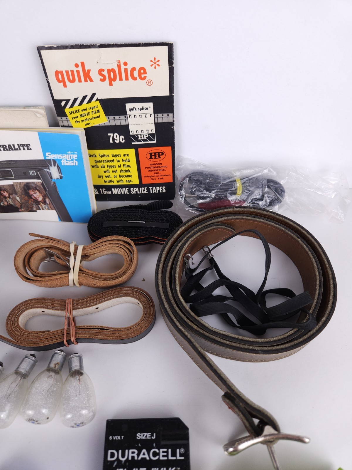 Junk Drawer Lot Of Vintage Camera Camcorder Parts – Bulbs Straps Tapes Manuals