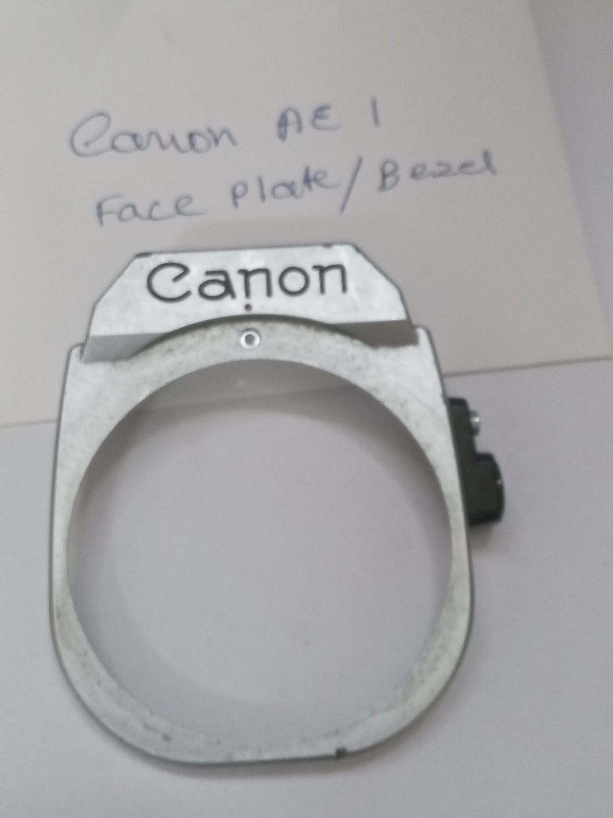 Canon AE 1 Film Face Plate / Bezel Original Used Part Good
