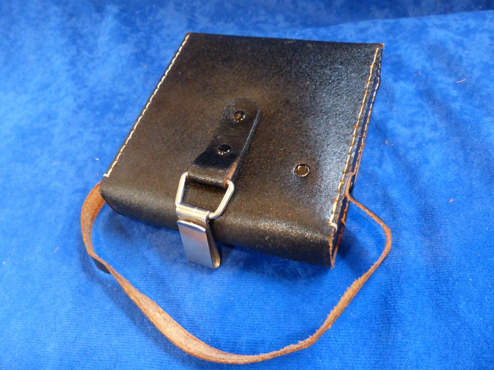 Vintage small black leather case w/ strap and metal clip, made in Japan