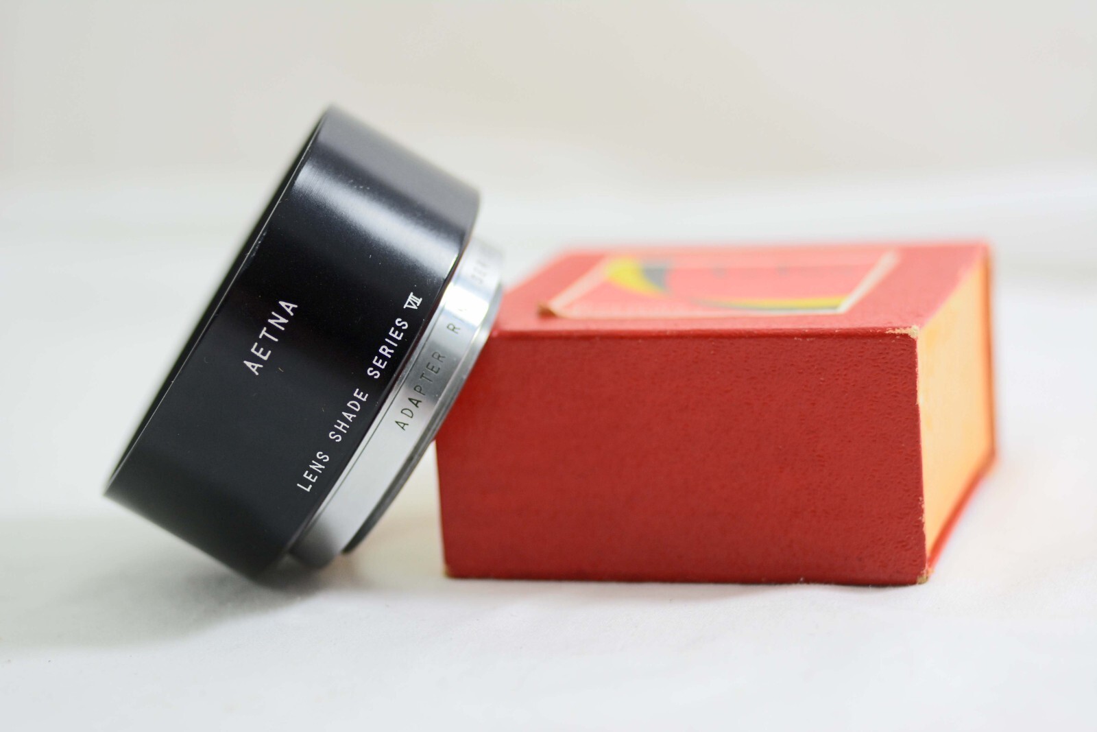 VINTAGE AETNA SERIES VII METAL CAMERA LENSHOOD WITH 49MM ADAPTER RING (MINT)