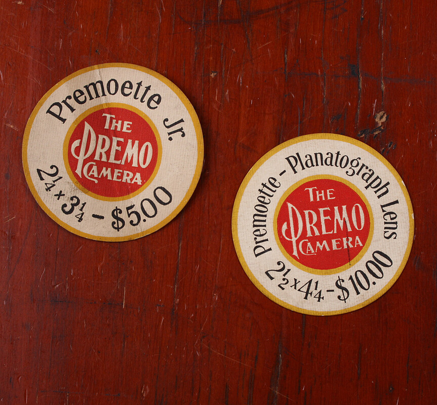 ROCHESTER OPTICAL PREMO + PREMOETTE SIGNS, 3 INCHES ACROSS, SET OF 2/cks/215823
