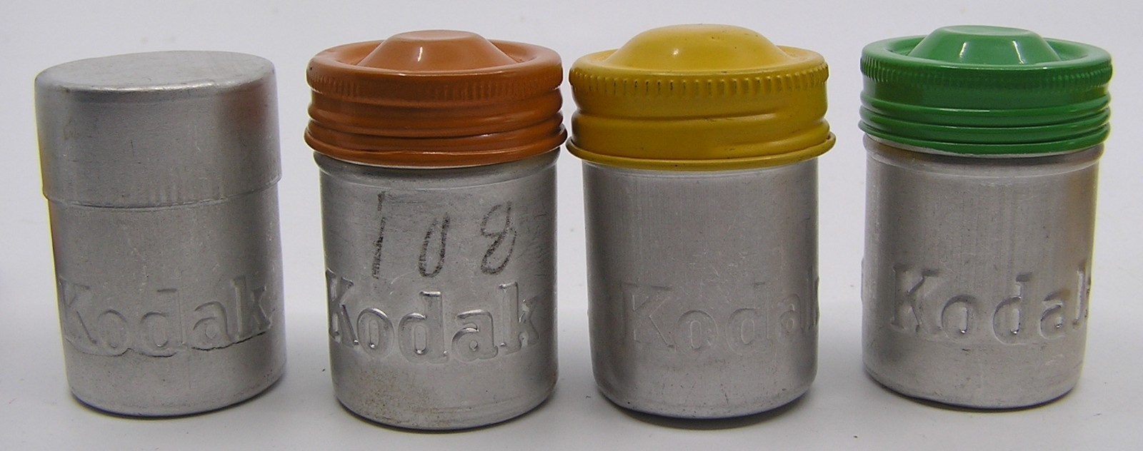 10 Vintage Kodak Embossed 35 MM Metal Tin Film Empty Canisters & 4 Films