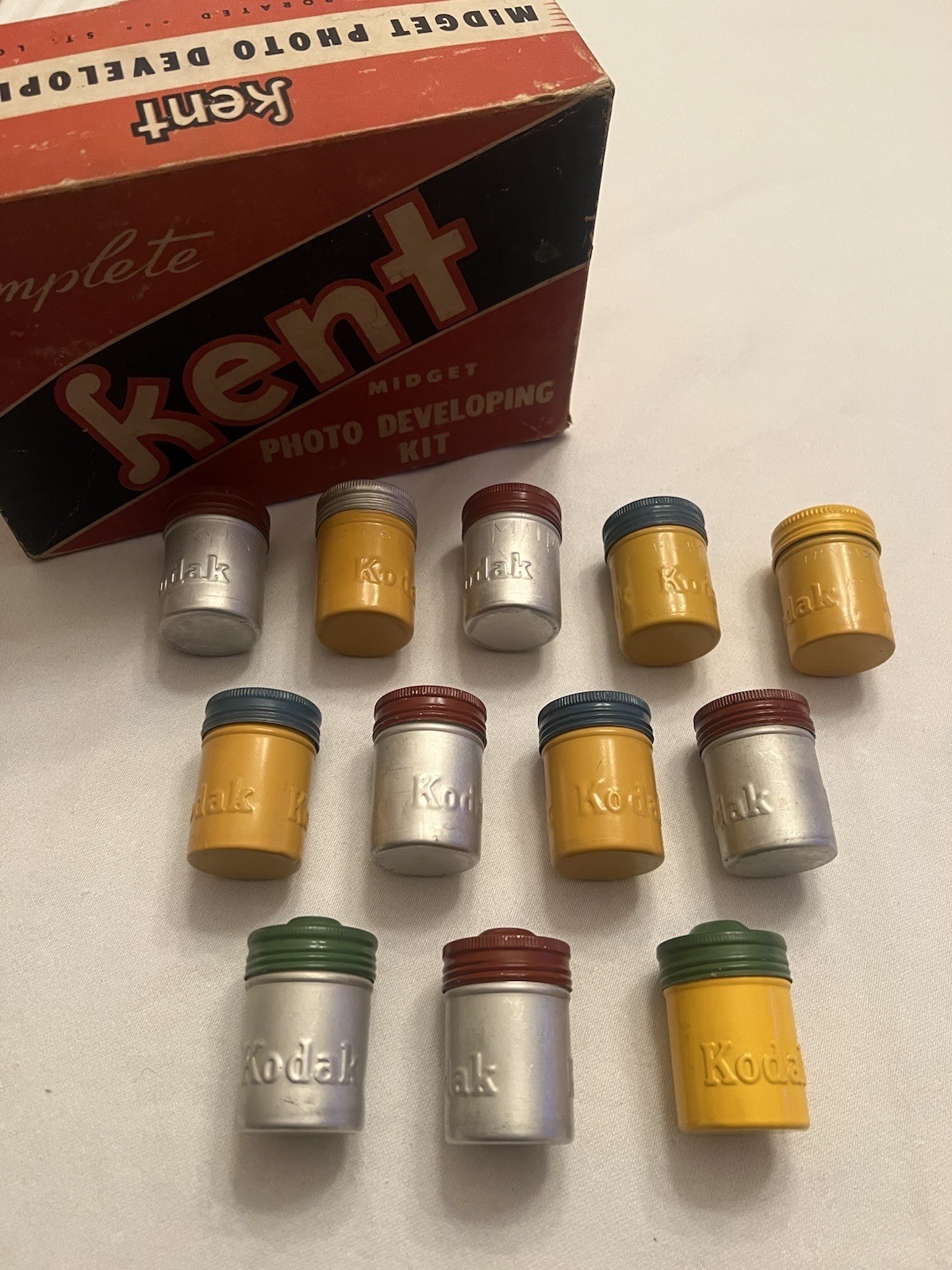 12 Vintage Kodak Colored Metal Film Tin Canisters