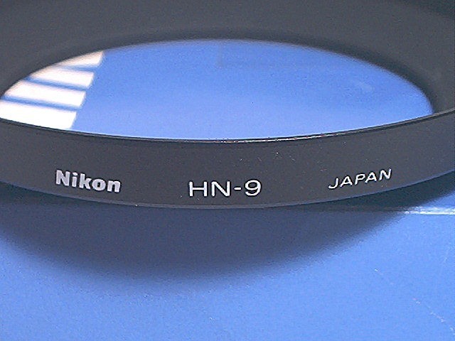 NIKON HN-9 SCREW ON TYPE LIGHT HOOD FOR 28MM & 20MM – UNUSED IN ORIGINAL BOX