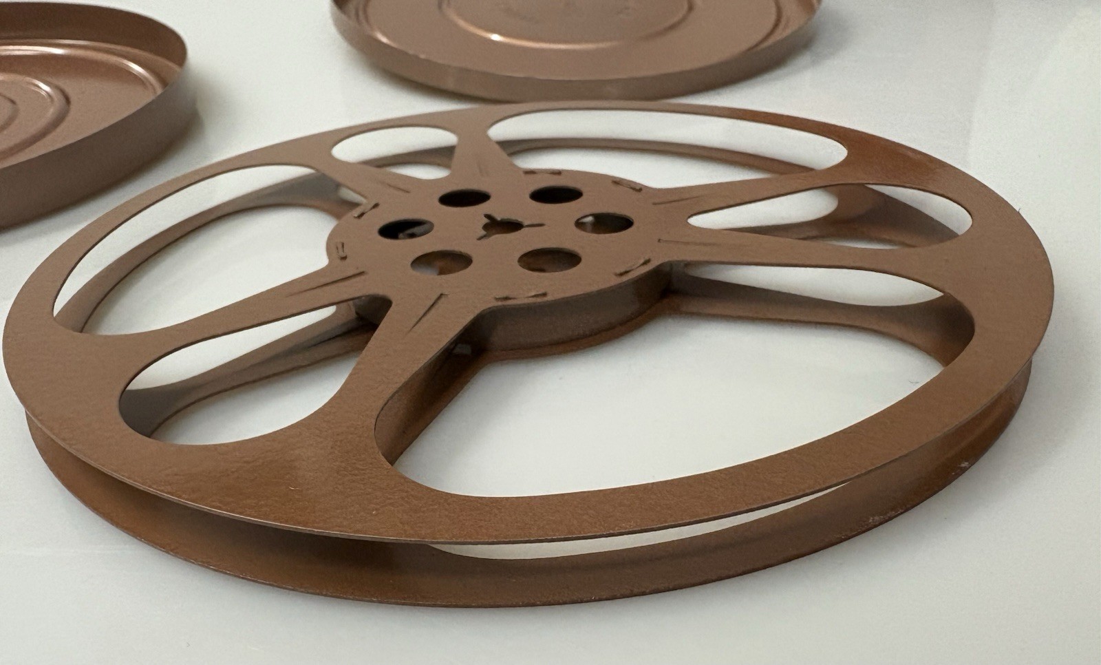 Coillots Motion Picture Film Canister and 7” Empty Reel