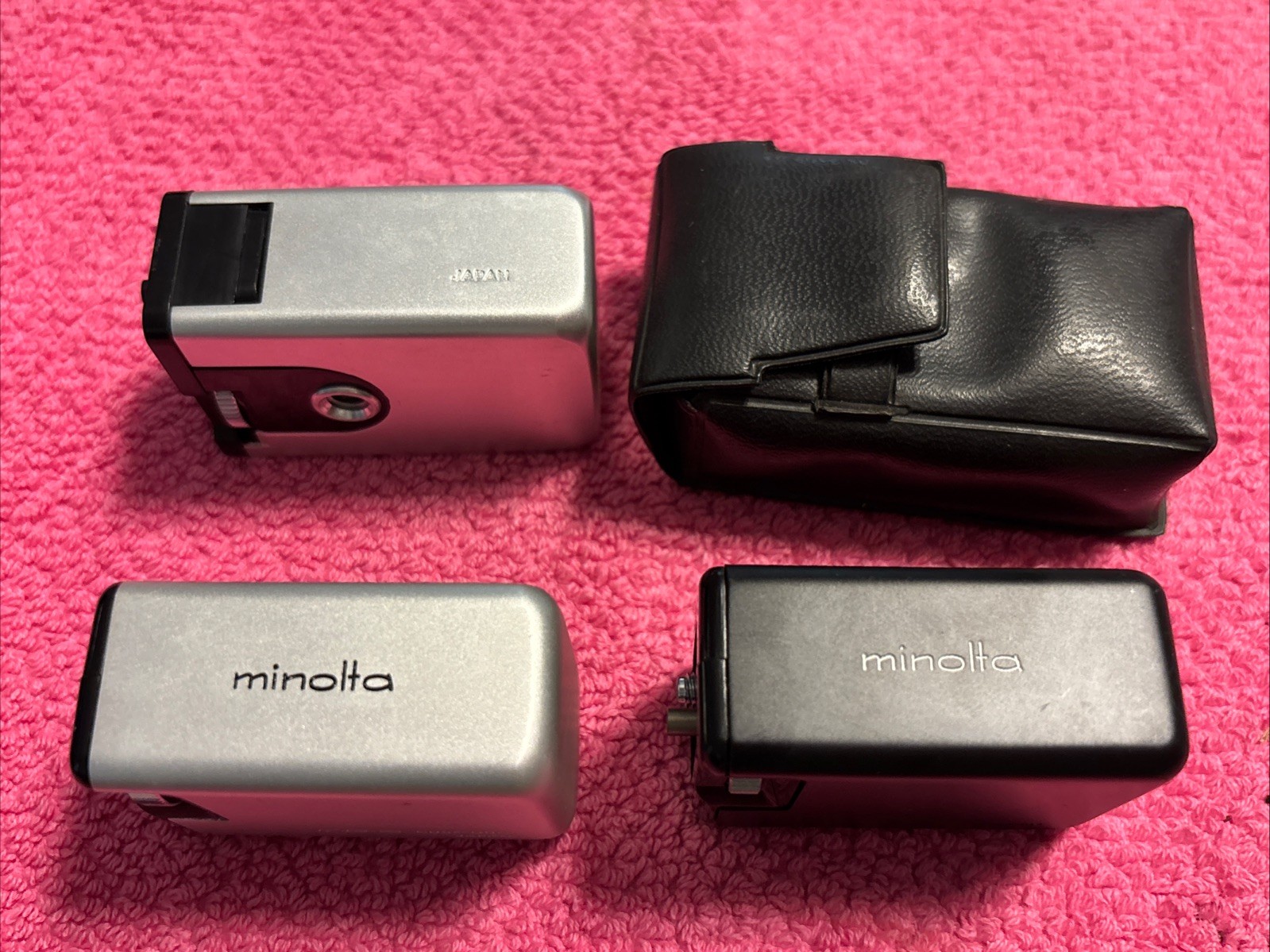 Minolta MG-S Accessories. 2 Cube Guns (Black & Silver) & MG Flash w/case.