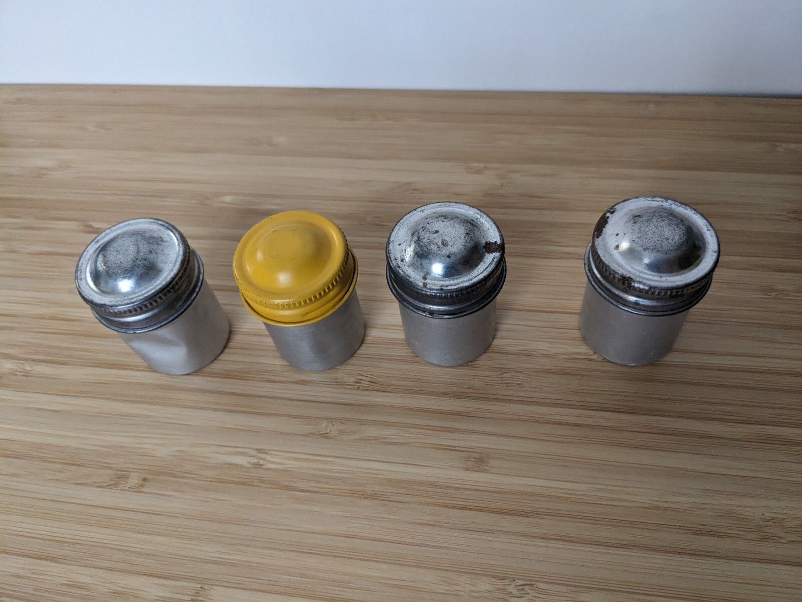 Four Vintage 35mm aluminum film canisters unbranded W/ metal top